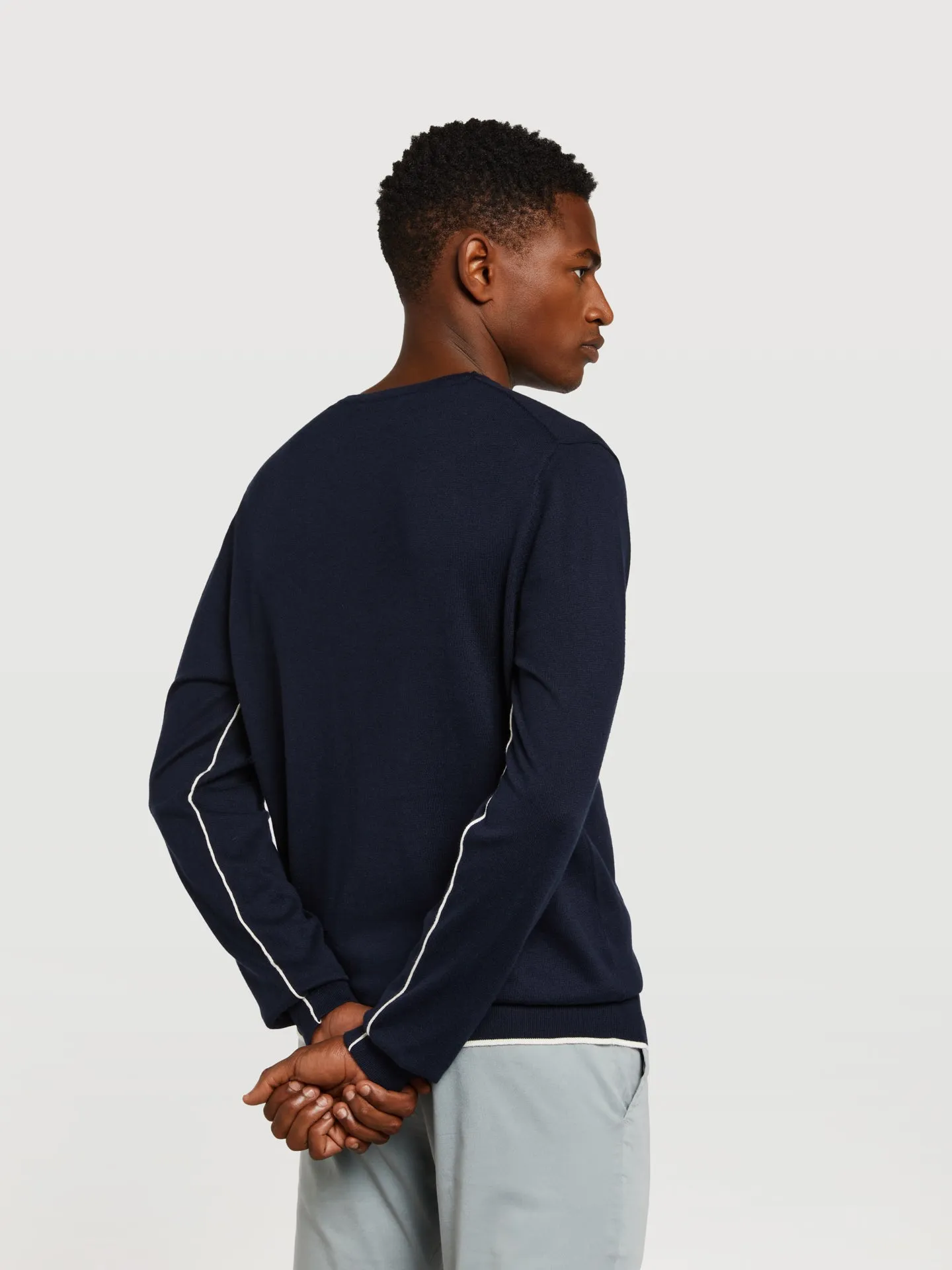 V-neck sweater with contrasting piping